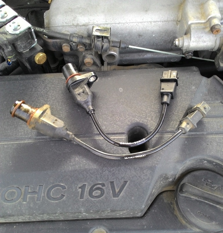 Старый и новый датчики коленвала