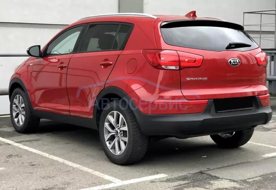 kia sportage ручник где находится
